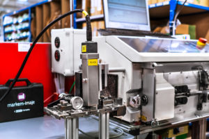 Drukarka Markem-Imaje 9450C na linii produkcyjnej - znakowanie kabli